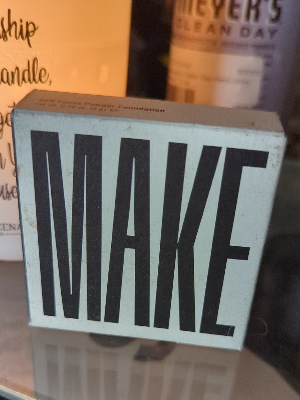 ME Makeover Essentials Soft Focus Powder Foundation in Beige with Black Text